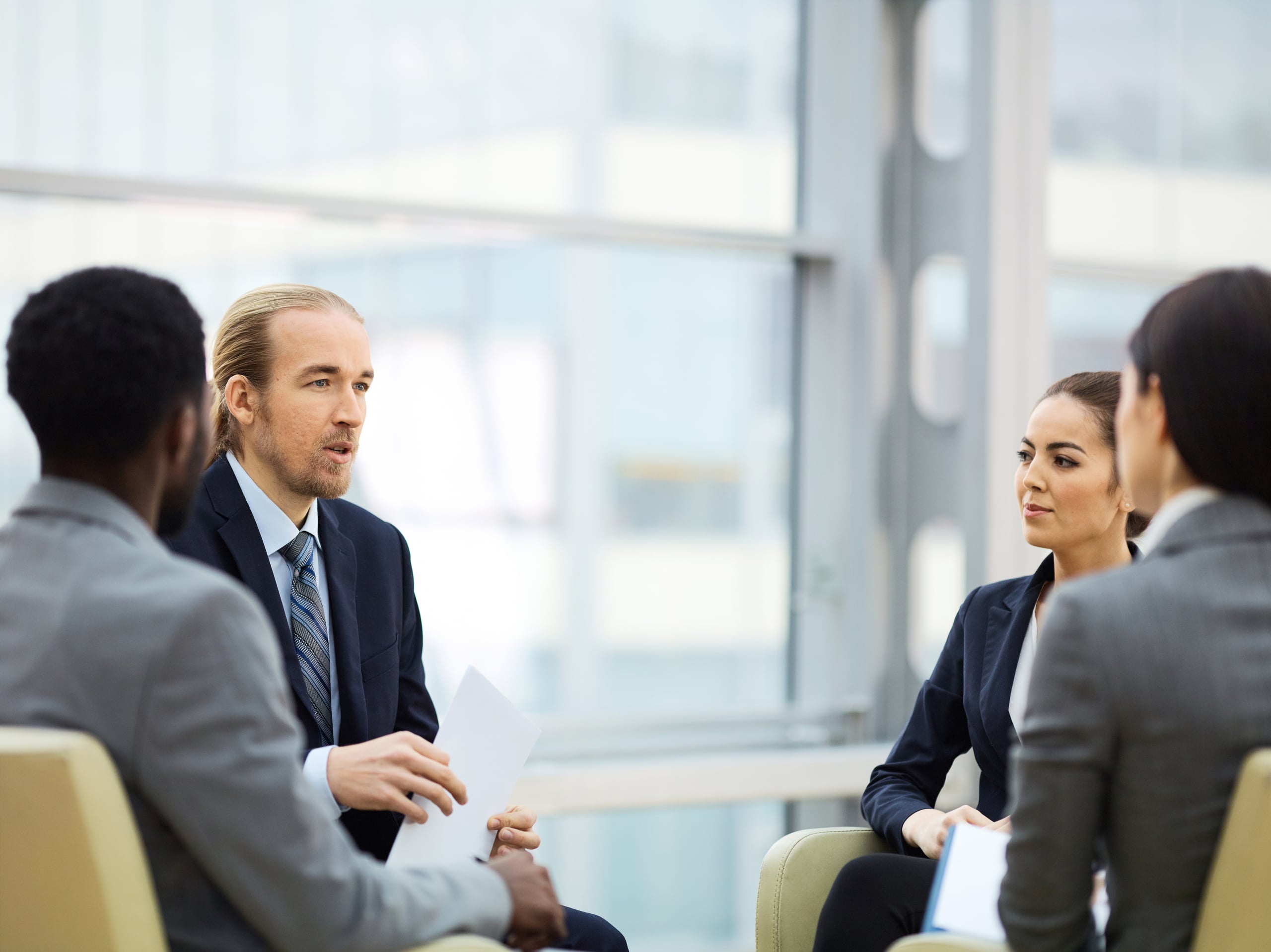 Executive team reviewing a roadmap in a bright office